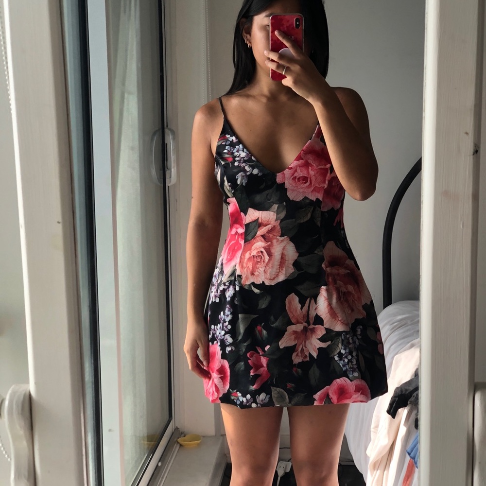 Akira Floral dress with slight peplum size medium